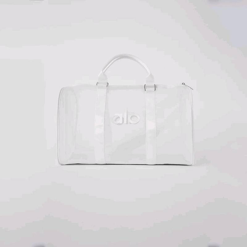 ALO YOGA💰98💎支持一件代发
aloyoga透明网包行李包瑜伽健身包女包户外健身包旅行斜跨包
【品牌】ALO 
【款号】JY51
【面料】PVC
【颜色】黑色，白色
【尺码】均码
 专柜同款品质，厂家直销，货源充足，售后保障