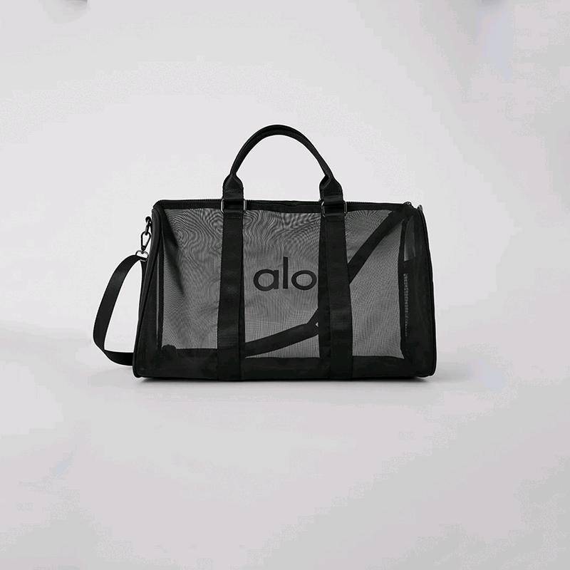 ALO YOGA💰98💎支持一件代发
aloyoga透明网包行李包瑜伽健身包女包户外健身包旅行斜跨包
【品牌】ALO 
【款号】JY51
【面料】PVC
【颜色】黑色，白色
【尺码】均码
 专柜同款品质，厂家直销，货源充足，售后保障