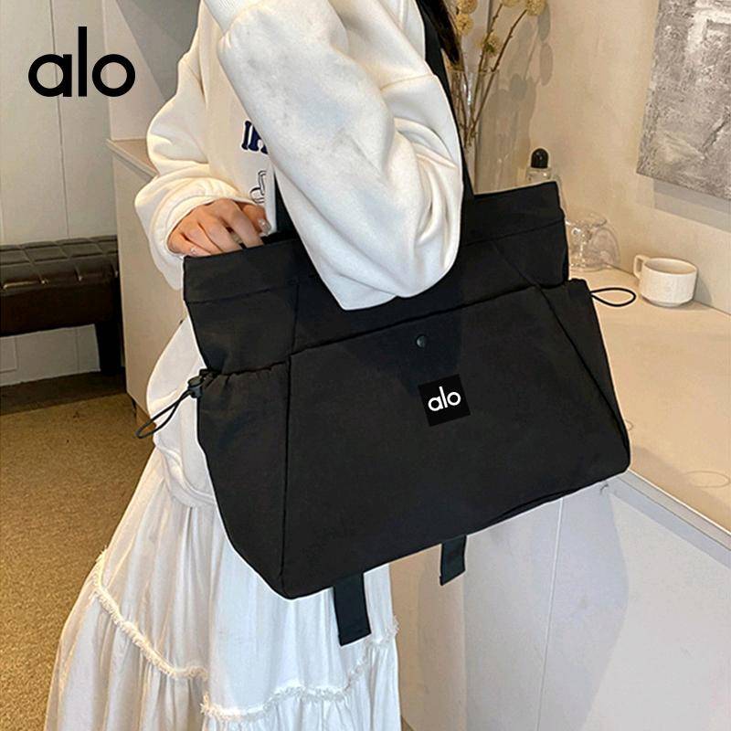 ALO YOGA💰98💎支持一件代发
aloyoga单肩包纯色大容量瑜伽休闲通勤手提包
【品牌】ALO 
【款号】JY90002
【面料】尼龙
【颜色】黑色，粉红色，灰色，卡其色
【尺码】均码
 专柜同款品质，厂家直销，货源充足，售后保障