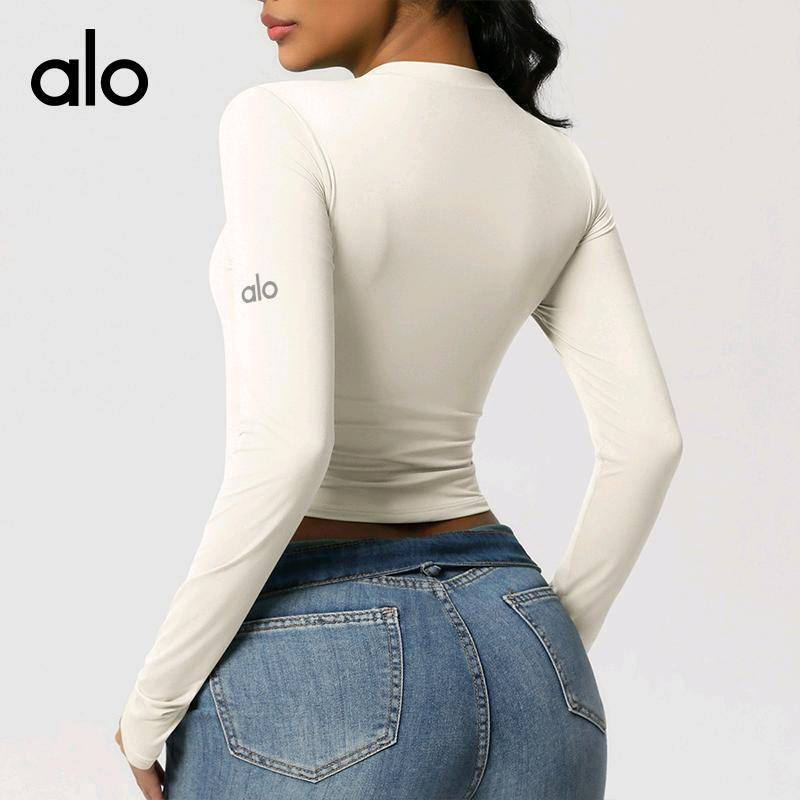 ALO YOGA💰68💎支持一件代发
aloyoga长袖紧身高弹瑜伽速干长袖T恤户外运动健身瑜伽服
【品牌】ALO 
【款号】CX7089
【面料】锦纶，氨纶
【颜色】板栗色，海军蓝，黑色，酒红色，蓝灰色，浅象牙
【尺码】S，M，L，XL
 专柜同款品质，厂家直销，货源充足，售后保障