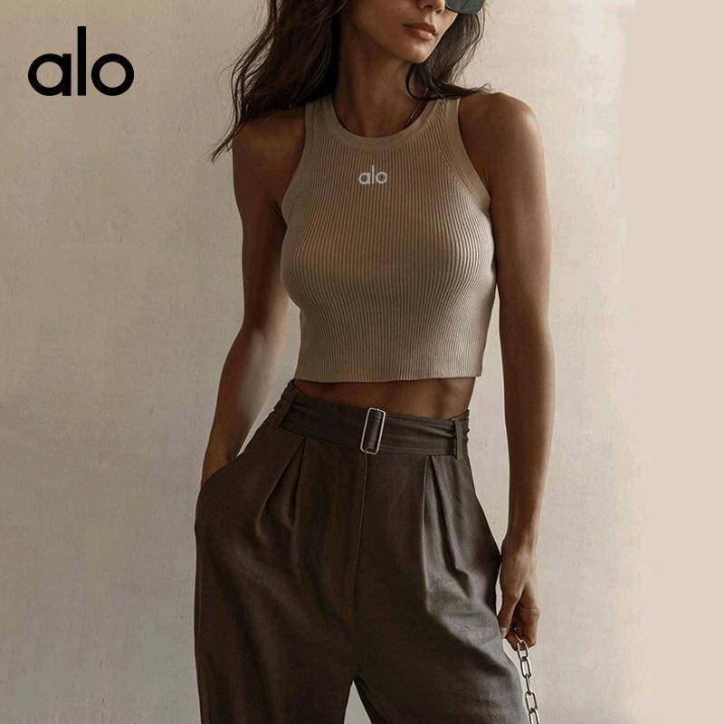 ALO YOGA💰63💎支持一件代发
aloyoga背心螺纹针织背心纯色修身内搭上衣短款
【品牌】ALO 
【款号】BX0008
【面料】涤纶/粘纤/尼龙
【颜色】白色，橙色，黑色，灰色，卡其色，玫红色，紫色
【尺码】均码
 专柜同款品质，厂家直销，货源充足，售后保障