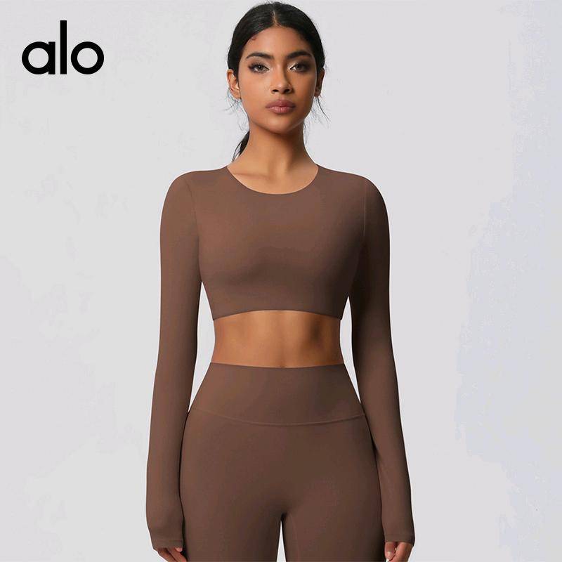 ALO YOGA💰88💎支持一件代发
aloyoga 可拆卸杯垫长袖健身服紧身瑜伽服普拉提跑步运动长袖上衣
【品牌】ALO 
【款号】CX7104
【面料】氨纶/锦纶
【颜色】霜灰色，板栗色，黑色，徽章蓝，罗勒绿，浅象牙，石墨灰，天空蓝，胭脂红，樱花粉
【尺码】S，M，L，XL
 专柜同款品质，厂家直销，货源充足，售后保障