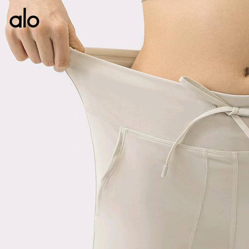 ALO YOGA 💰104💎支持一件代发 
aloyoga锦纶零感束腰抽绳阔腿裤双侧大口袋直筒百搭健身运动长裤
【品牌】alo
【款号】JY336
【面料】棉类混纺
【颜色】白蛋白，丛林绿，黑色，沥青蓝，石墨灰，蒸馏咖啡，棕褐色，比利时蓝，烤棕色，鼠尾草绿
【尺码】4，6，8，10，12
 专柜同款品质，厂家直销，货源充足，售后保障