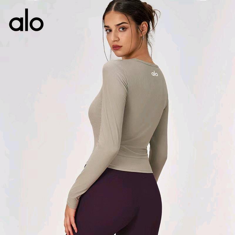 ALO YOGA 💰78💎支持一件代发
alo袖速干衣运动透气薄款圆领侧褶皱修身长袖健身服上衣
【品牌】ALO 
【款号】CX115
【面料】锦纶/尼龙
【颜色】暮色玫瑰，生亚麻色，时尚黑，象牙白
【尺码】S，M，L，XL
 专柜同款品质，厂家直销，货源充足，售后保障
