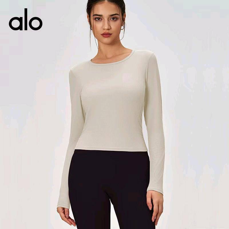 ALO YOGA 💰78💎支持一件代发
alo袖速干衣运动透气薄款圆领侧褶皱修身长袖健身服上衣
【品牌】ALO 
【款号】CX115
【面料】锦纶/尼龙
【颜色】暮色玫瑰，生亚麻色，时尚黑，象牙白
【尺码】S，M，L，XL
 专柜同款品质，厂家直销，货源充足，售后保障