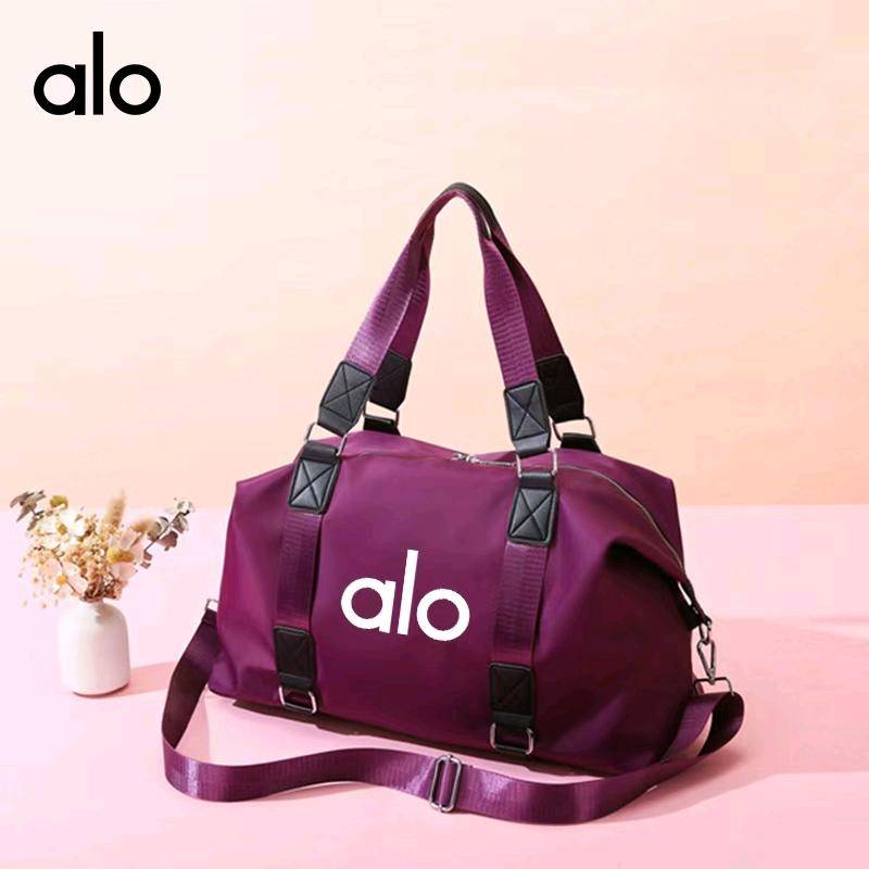 ALO YOGA 💰65💎支持一件代发 
aloyoga 健身包手提瑜伽包女干湿分离防水大容量行李包短途旅行包
【品牌】ALO 
【款号】JY22
【面料】防泼水牛津布
【颜色】黑色，卡其色，浅粉色，深蓝色，紫红色
【尺码】均码
 专柜同款品质，厂家直销，货源充足，售后保障
