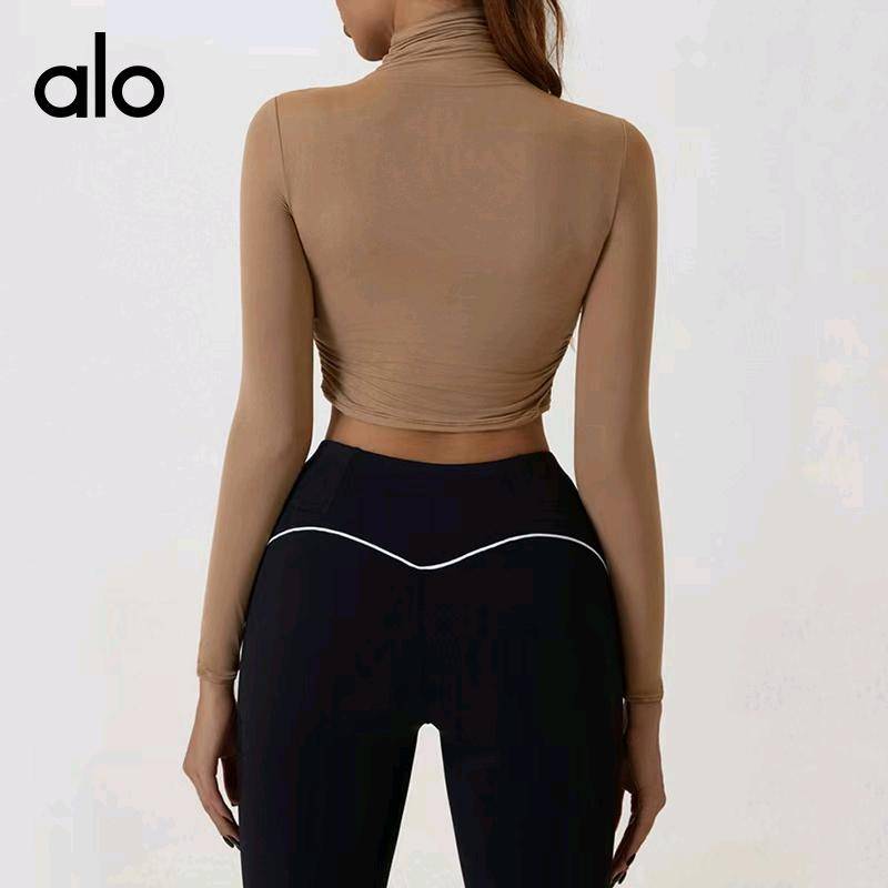 ALO YOGA 💰73💎支持一件代发
aloyoga 跨境瑜伽服长袖打底衫短款高领秋衣女露脐运动上衣
【品牌】ALO 
【款号】CX2771
【面料】棉
【颜色】黑色，可可色，白色
【尺码】S，M，L，XL
 专柜同款品质，厂家直销，货源充足，售后保障